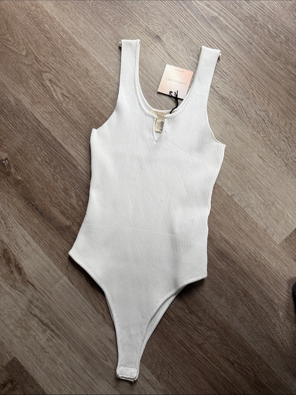 White Ribbed One-Piece Bodysuit